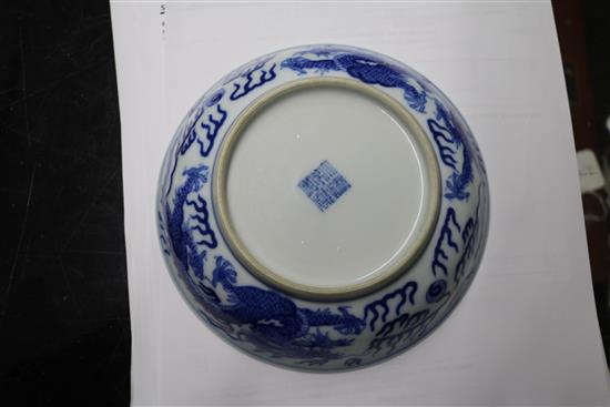 A Chinese blue and white dragon dish, diameter 16.3cm, some damage